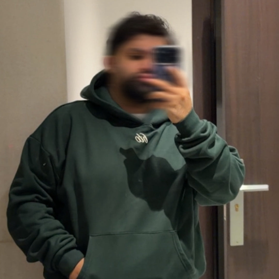 don’t be realistic club hoodie